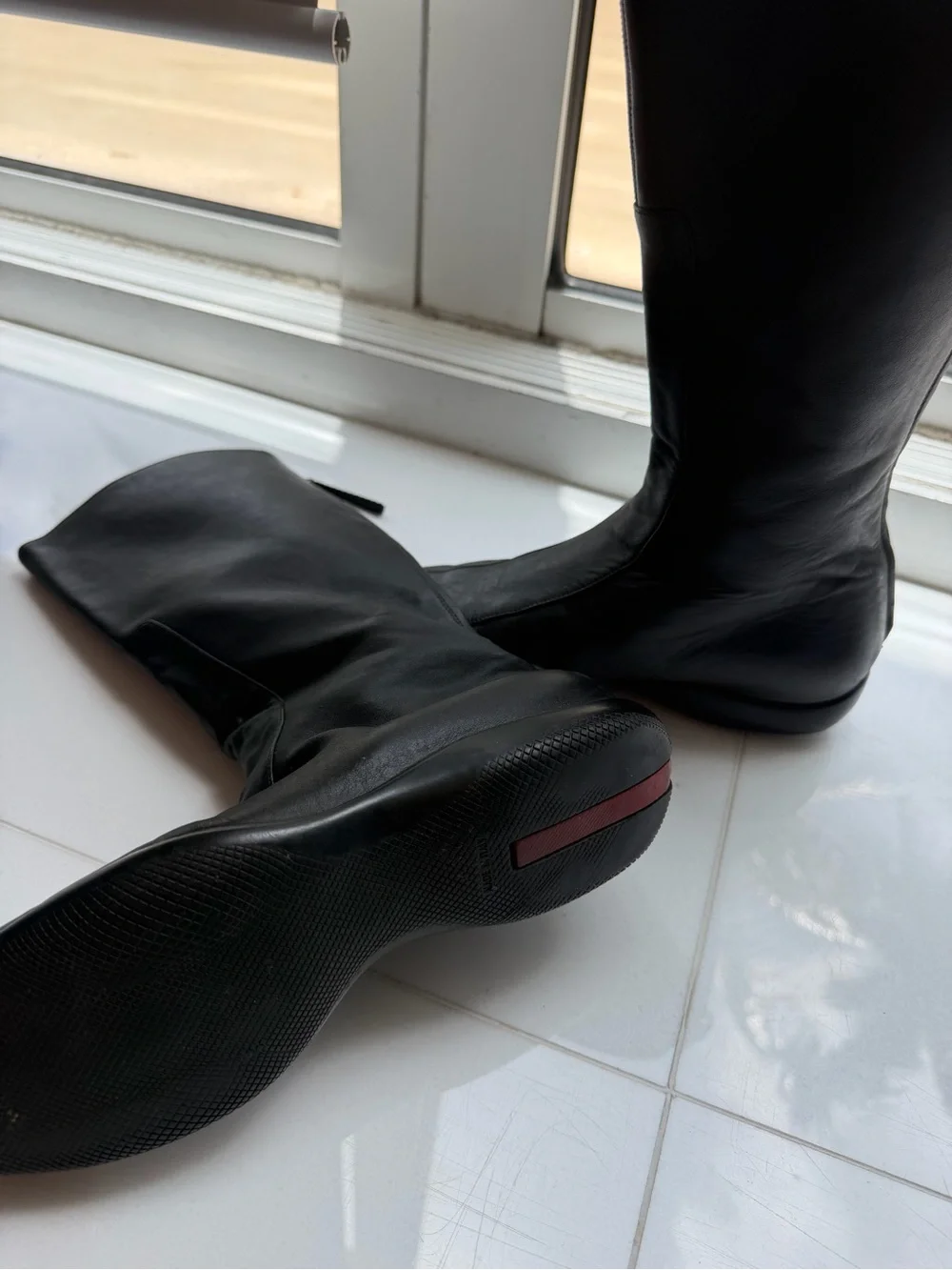 Prada Black Leather Over-The-Knee Boots with Red Heel Tab